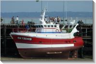 Cancale (2009-08-20) Clement Thomas Elena &agrave; mar&eacute;e basse &agrave; Cancale